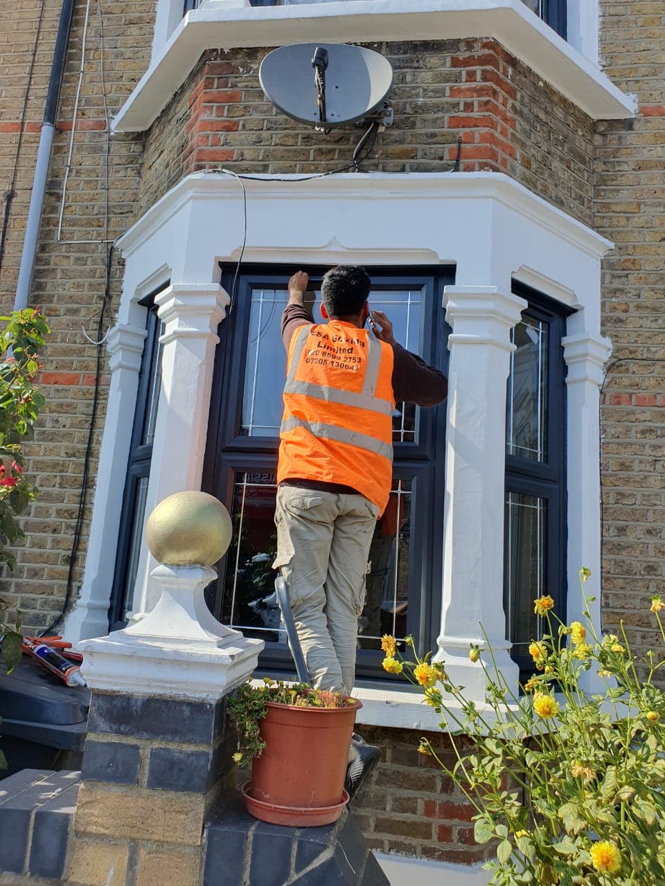 Professional glazier at work